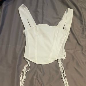 White stringed top